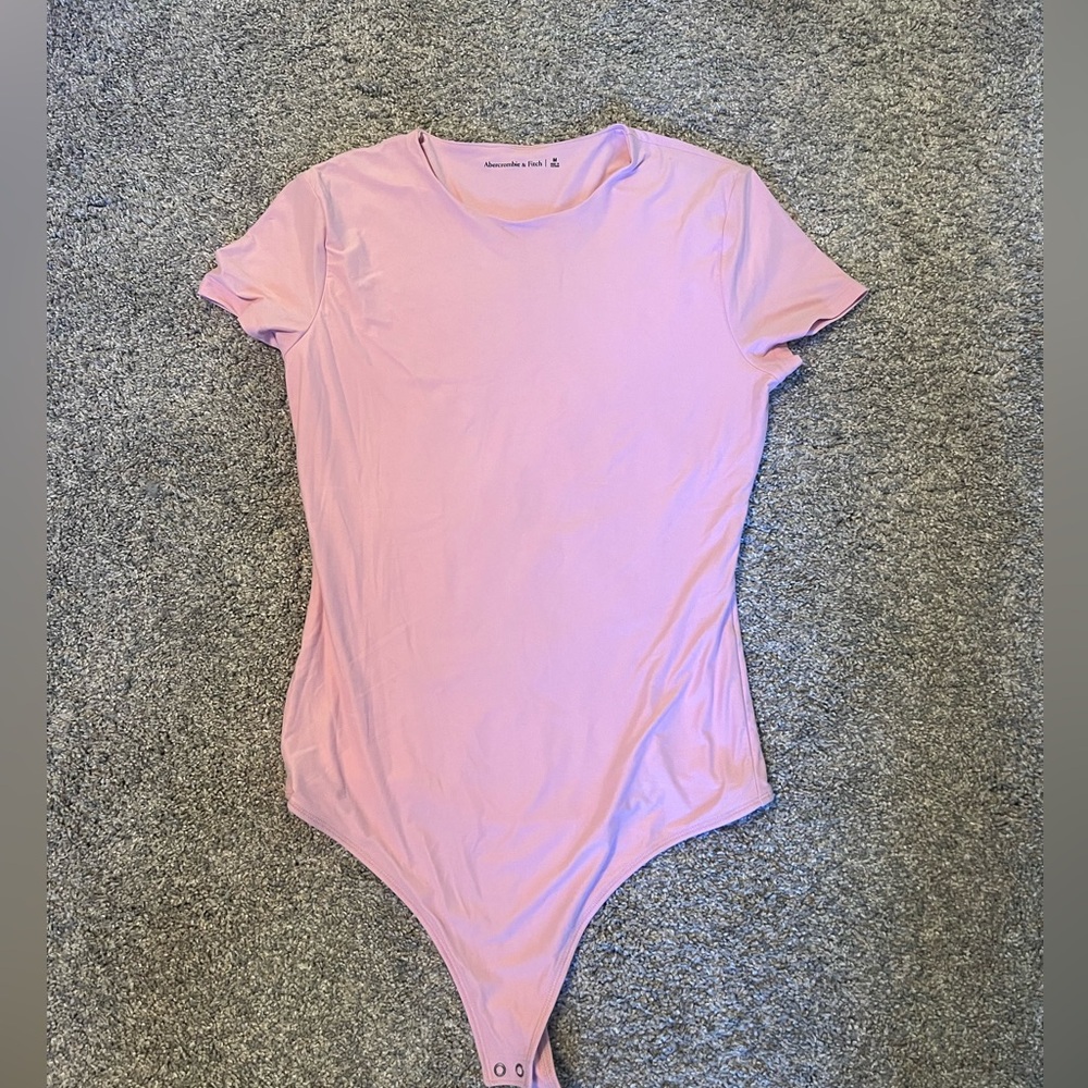 Super cute bubblegum pink body suit